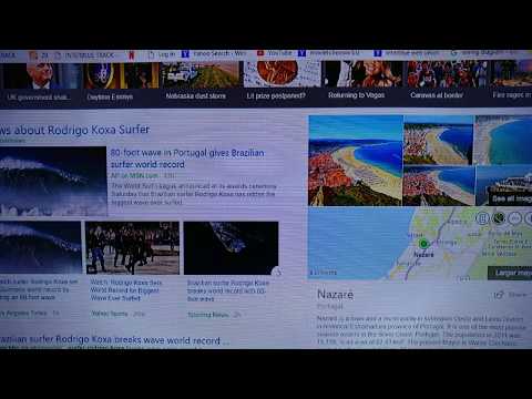 BRAZILIAN RODRIGO KOXA SURFS WORLD RECORD 80 FOOT WAVE IN PORTUGAL