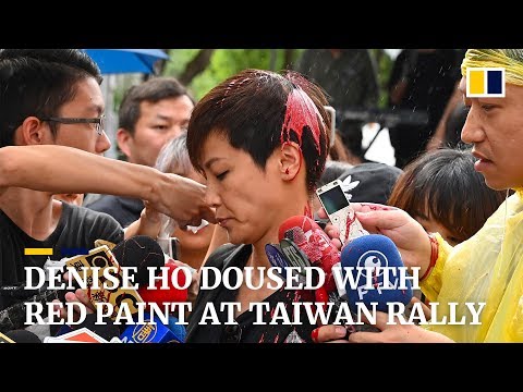 Denise Ho doused with red paint at Taiwan rally