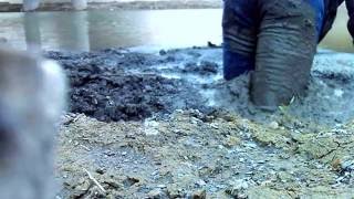 Barefoot in neoprene boots and jeans in VERY deep mud!!  (STUCK)
