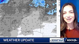 Meteorologist Taylor Cox shows the wind chill in the low 20s this morning.
