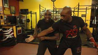 Defence Against A Hook Punch To The Head - Self Defence Techniques