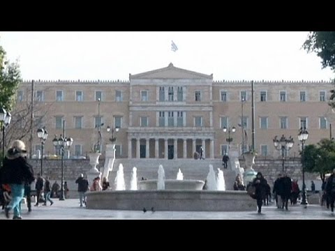 What did Eurogroup head whisper to Greek minister after frosty meeting?