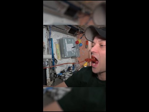 Astronaut shows how to eat ketchup at zero gravity