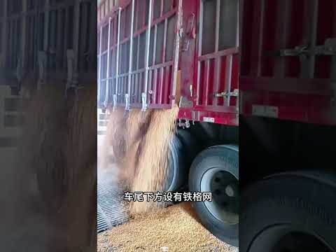 A revolutionary way to unload grain! The entire truckload of materials is dumped directly onto th...