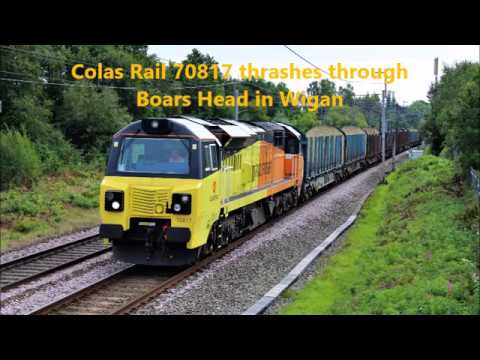 Colas 70817 thrashes Boars Head in Wigan on 6C37 Chirk to Carlisle log empties