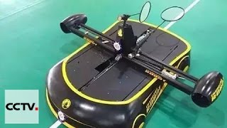 China robot challenges human players in badminton