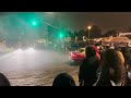 Hundreds watch as cars do donuts in Oakland sideshow