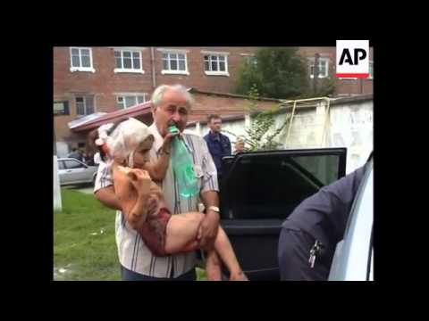 Hostages flee Beslan school siege - 2004