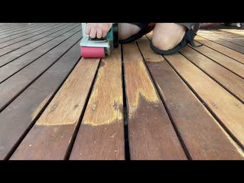 Sanding low spots on a deck with a belt sander…