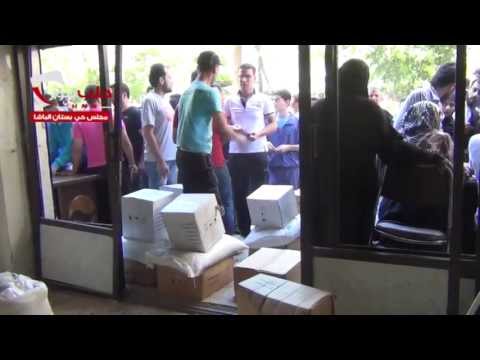 توزيع المعونات الإغاثية في بستان الباشا في محافظة حلب من قبل مجلس محافظة حلب