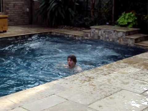 Insane back flip/belly flop mix off roof