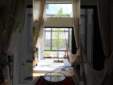 aménagement-terrasse-balcon-canape-table-rectangulaire-fleurs