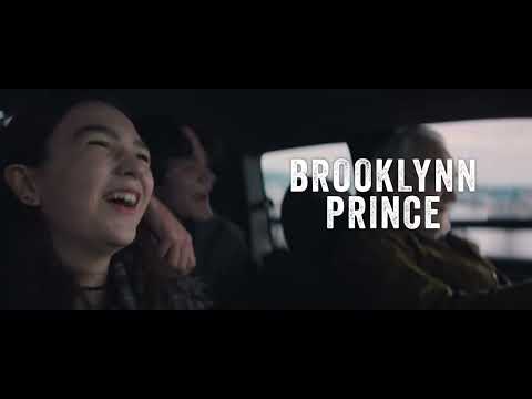 Trailer montage: rooftop coops, city spans, and fast cuts with a snare-driven cue