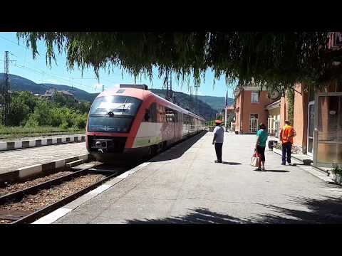 Train Sofia-Blagoevgrad leaving the central rail station of Pernik(Bulgaria)