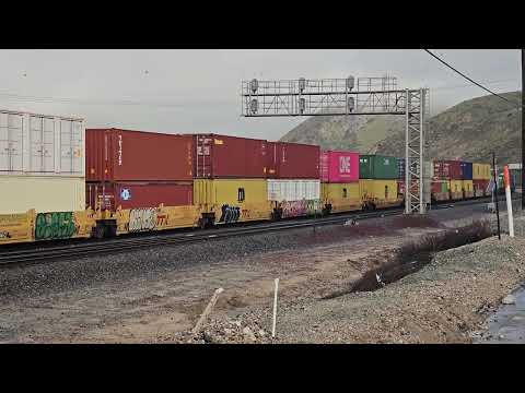 BNSF, Union Pacific and Amtrak Southwest Chief on Cajon Pass on 03/20/2023.  Heritage Units!