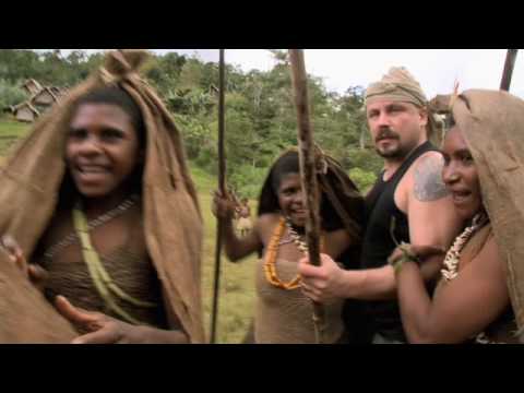Madventures New Guinea - Welcoming with bows & arrows