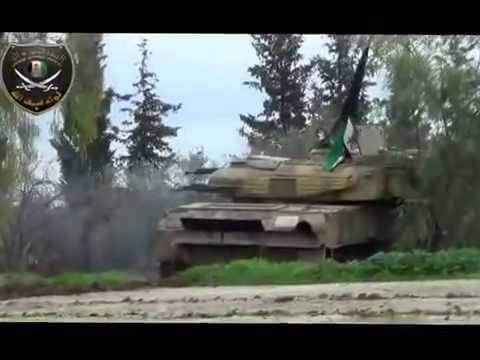 اشتباكات بين قوات النظام و الجيش الحر أثناء اقتحام حاجز لطمين أبو شفيق من قبل لواء سيف الله في مدينة كفر زيتا في ريف حماة