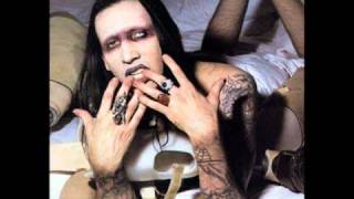 Dogma - Marilyn Manson [Lyrics, Video w/ pic.]