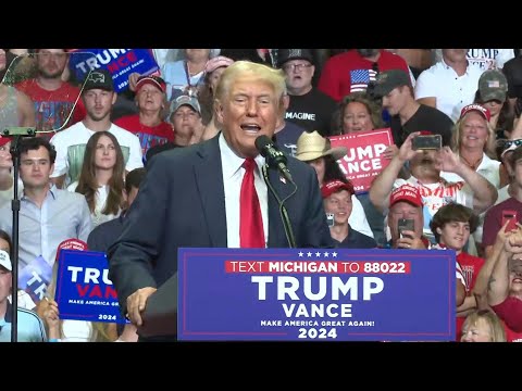 'I took a bullet for democracy,' Trump tells first rally since shooting | AFP