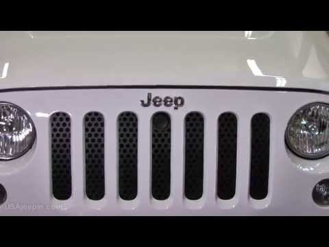 Bolt hood lock and JWM grill insert on Jeep JK Wrangler