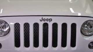 Bolt hood lock and JWM grill insert on Jeep JK Wrangler