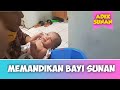 Memandikan Bayi Sunan