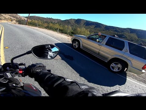 Bad Driver| Driver in Nissan Pathfinder Fails to see approaching Biker and pulls out| Escondido CA Video