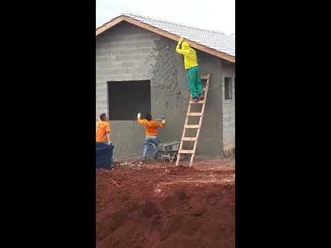 Mason worker is so good at his job that he doesn't even need scaffolding.