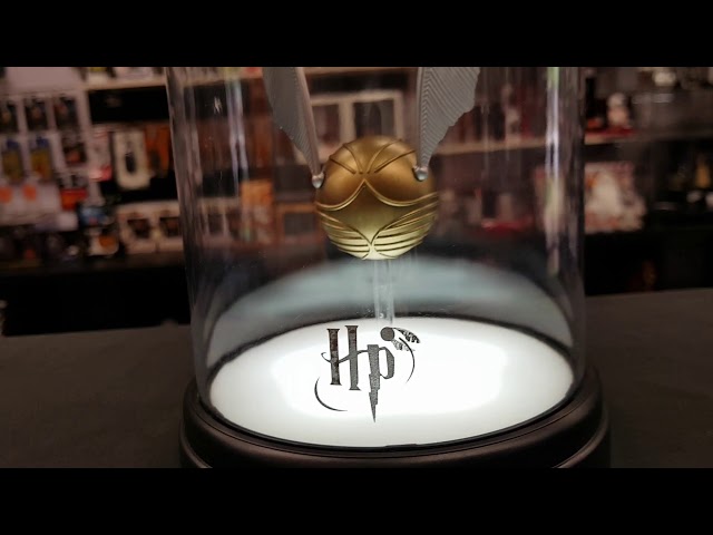 Vídeo relacionado con Lámpara líquida con brillo Hogwarts Harry Potter - Producto oficial, decoración coleccionable con snitch dorada y forma de rayo, merchandising del mundo mágico