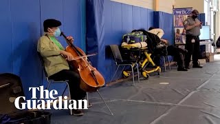 Yo-Yo Ma plays cello in vaccine waiting room in Massachusetts