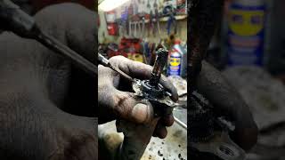 scraping baked-on carbon off an egr valve #auto #mechanic #repiar #shorts #ideas