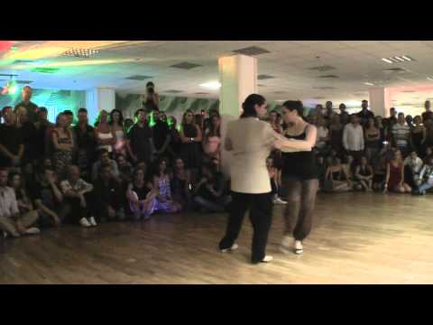  Fernando Sanchez  and  Ariadna Naveira  are  dancing  to  the  tango  "  Un Libro  "