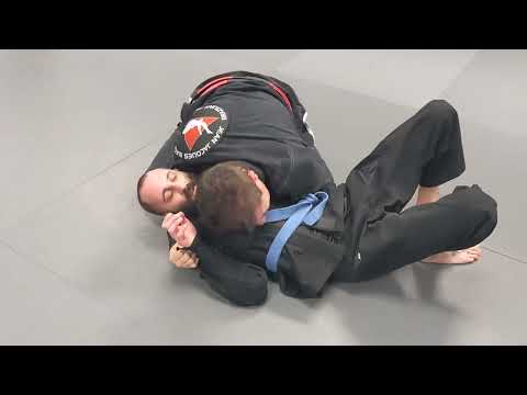 Jean Jacques Machado Rolling with Blue Belt Student
