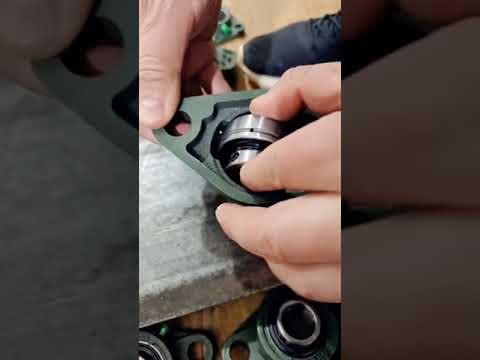 how to assemble insert bearing into bearing housing?