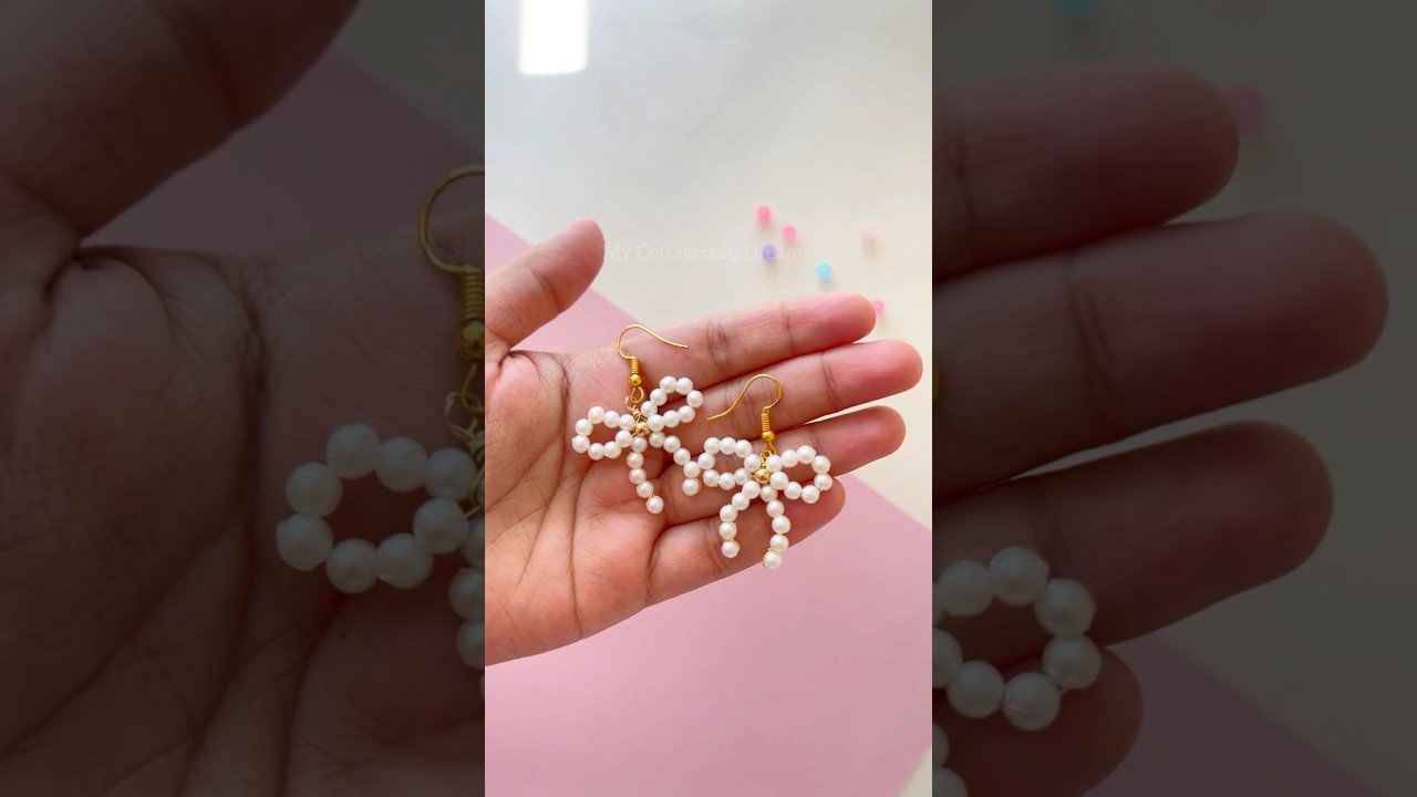 make beaded bow earrings with me 🎀 #diyjewelry #handbeadedjewelry #beadedjewelery
