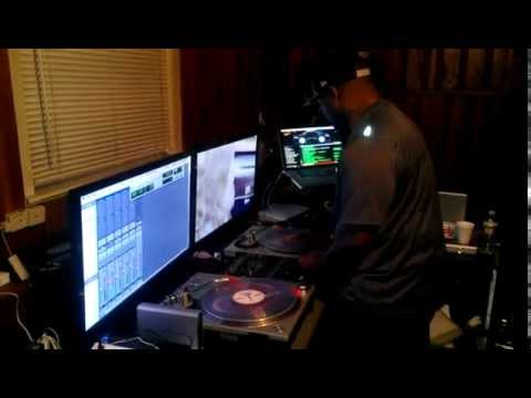 DJ CHEESE PRACTICING WITH MIXER IN MIDDLE