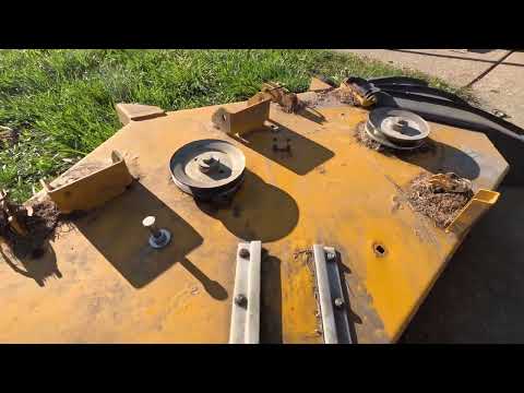 Hustler Mower Deck Idler Pulley Replacement and bent deck repair.