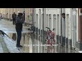 Wateroverlast in de Rotterdamse Oranjeboomstraat en Damstraat