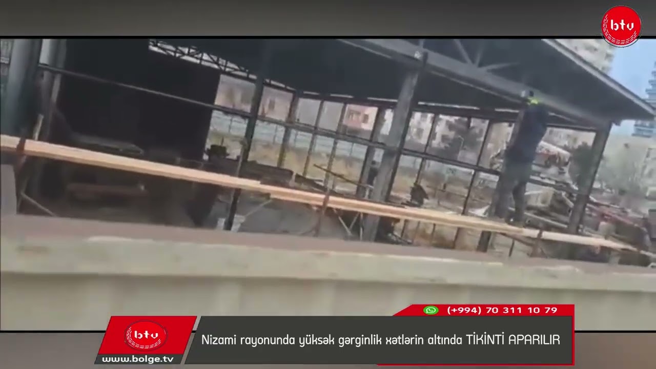 Nizami rayonunda yüksək gərginlik xətlərin altında TİKİNTİ APARILIR