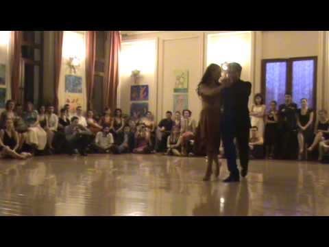  Adrian Veredice  and  Alejandra Hobert  are  dancing  to  a  nontraditional song  at  Bucharest Tango Encuentro Festival  in  2010