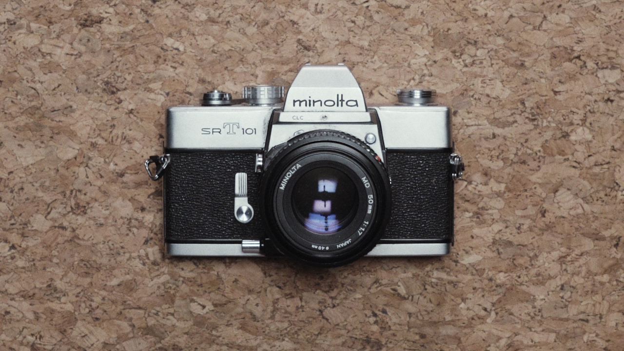 Câmera Analógica Minolta SRT 101 com Lente 28mm Milda - Robusta e Pr