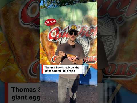 Thomas Sticha reviews the giant egg roll on-a-stick #ThomasSticha