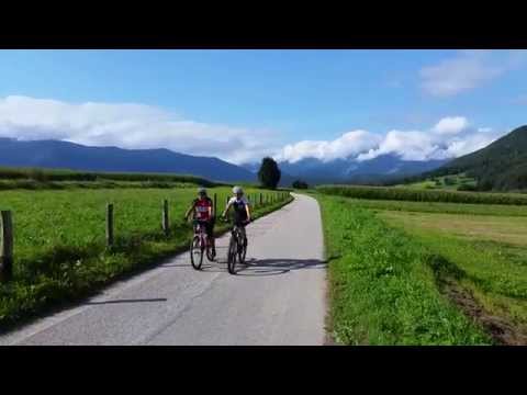 Watching vacationing bikers on the bike path in Gais Italy