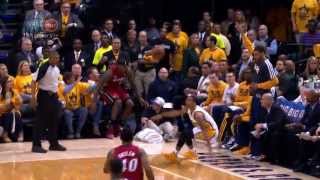 LeBron James falls into Shaq&#39;s lap!