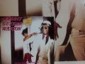 JOHNNY "GUITAR" WATSON. "Booty Ooty". 1980 ...
