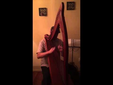 Playing My Lion Harp