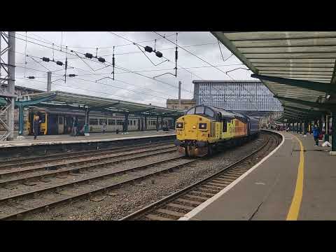 Colas 37099 and 37116 leave Carlisle