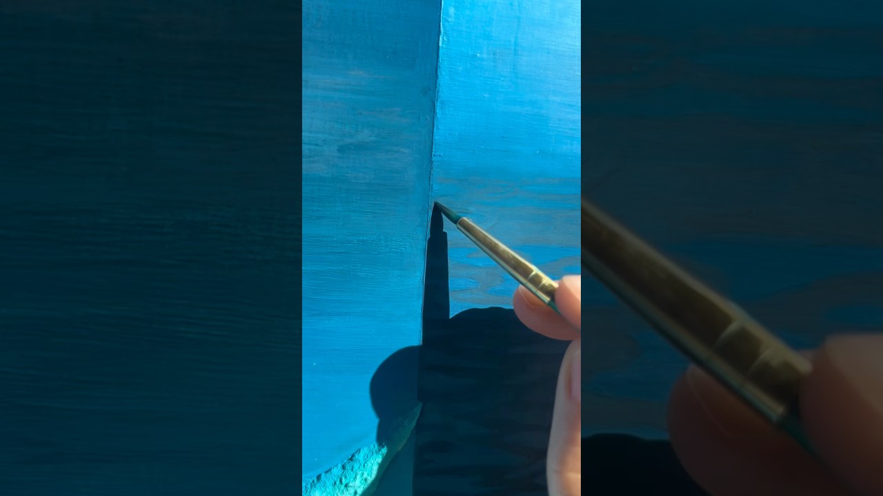 A crescent moon on calm water🌙