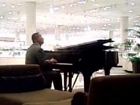 Nordstrom Guy Playing Piano