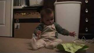 Nathan Playing with Paper